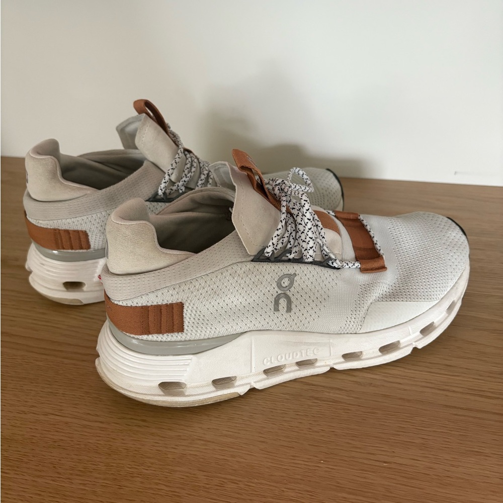 On Running White and Tan Athletic Shoes